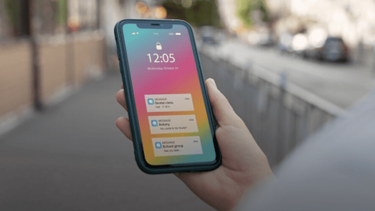 an-iPhone-in-the-hand-of-a-woman
