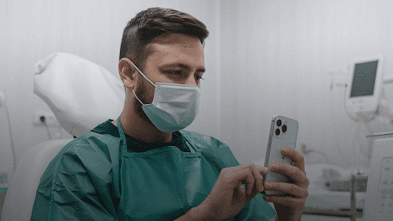 a-doctor-using-a-medical-app